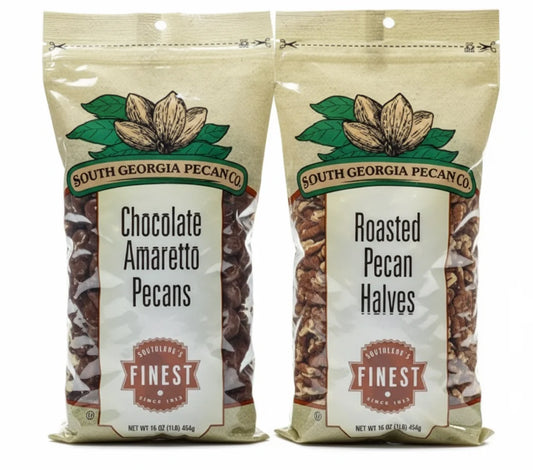 Two 16 oz bags of South Georgia Pecan Co. Chocolate Amaretto Pecans and Roasted Pecan Halves.